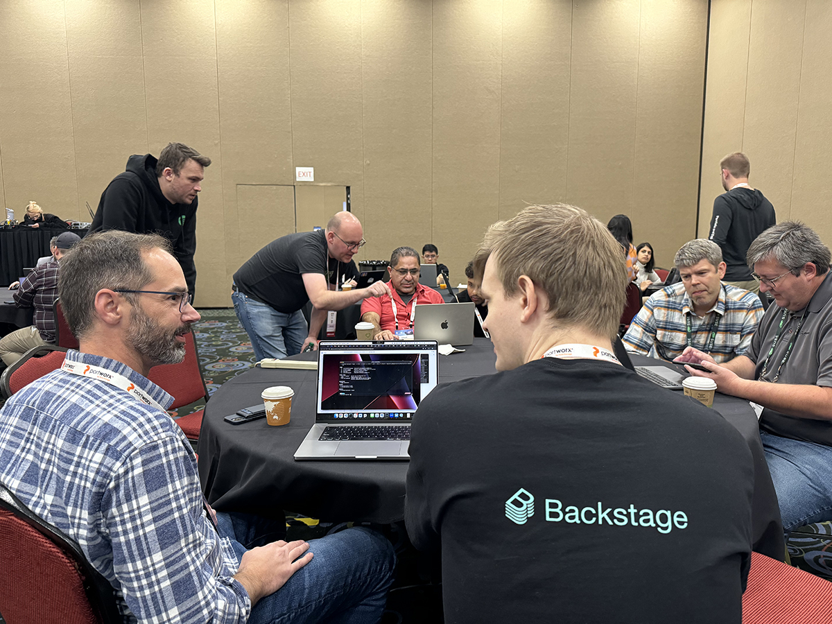 A room full of developers working together at the first Backstage Contribfest